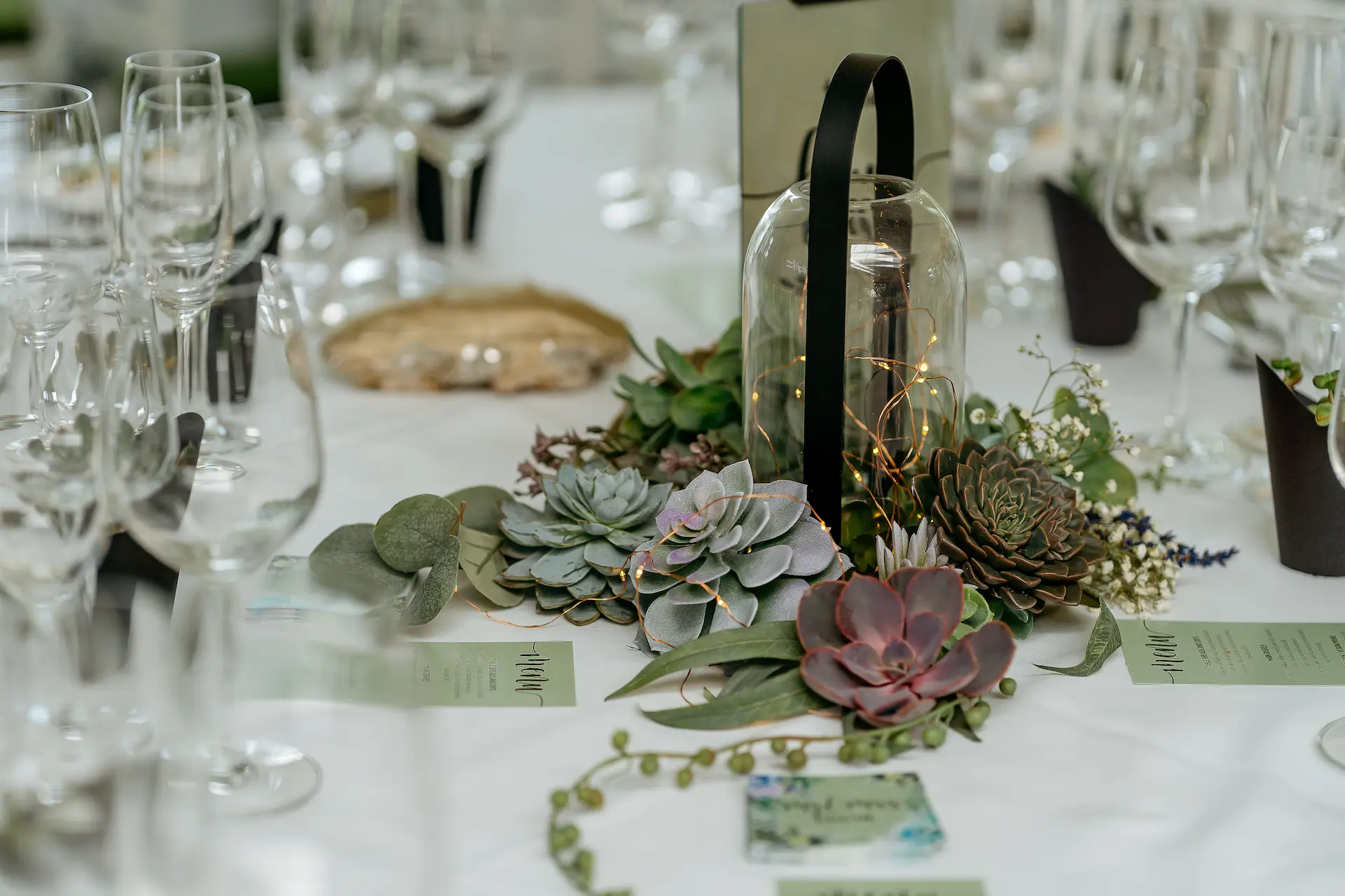 close up of cutlery on a table at a wedding
