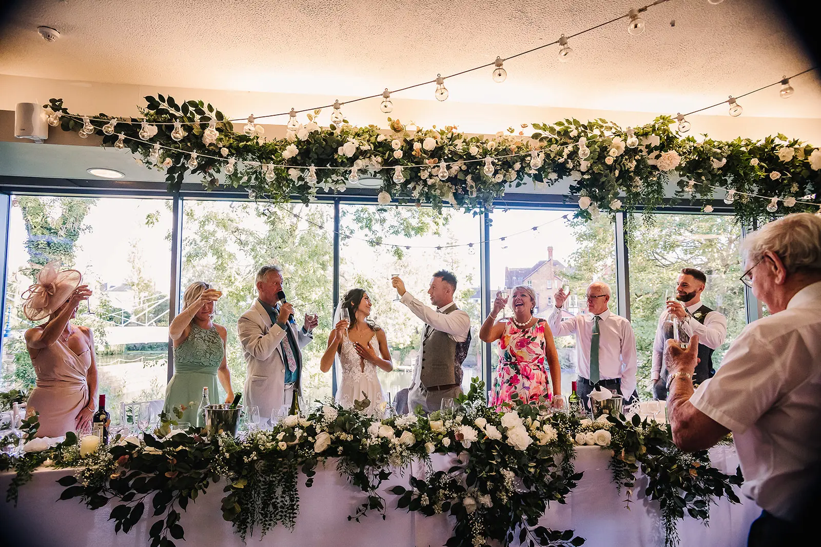 group of people enjoying themselves at a wedding